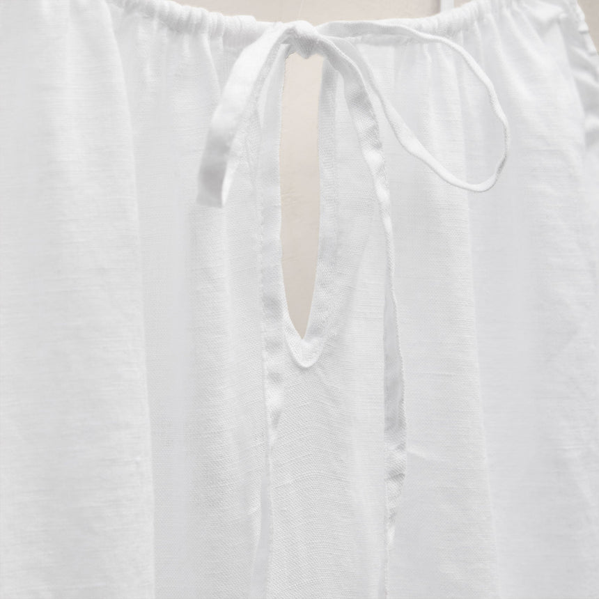 white linen strappy dress WHITE LINEN CROSS-STRAP DRESS